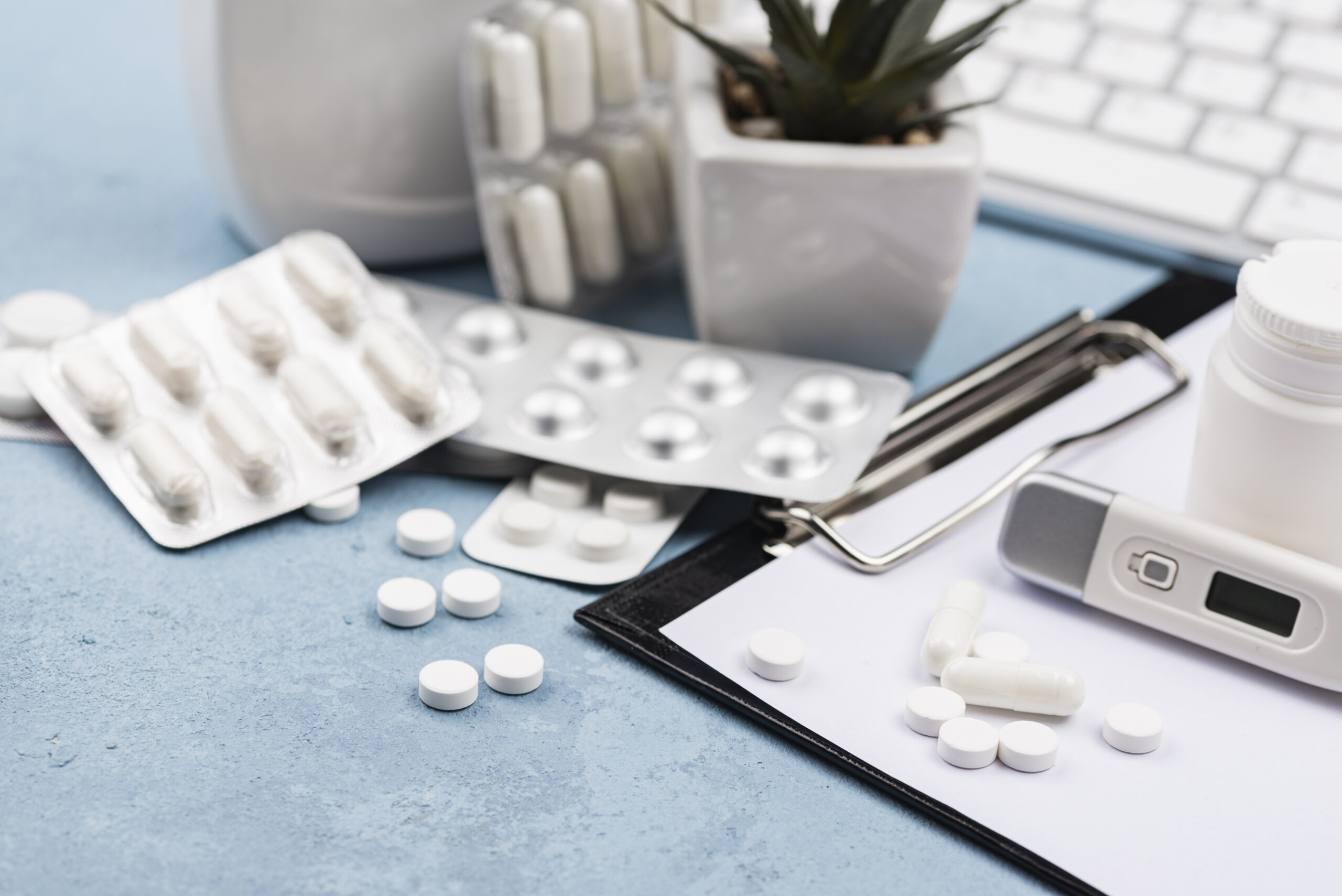 Medical pills and blister packs with thermometer